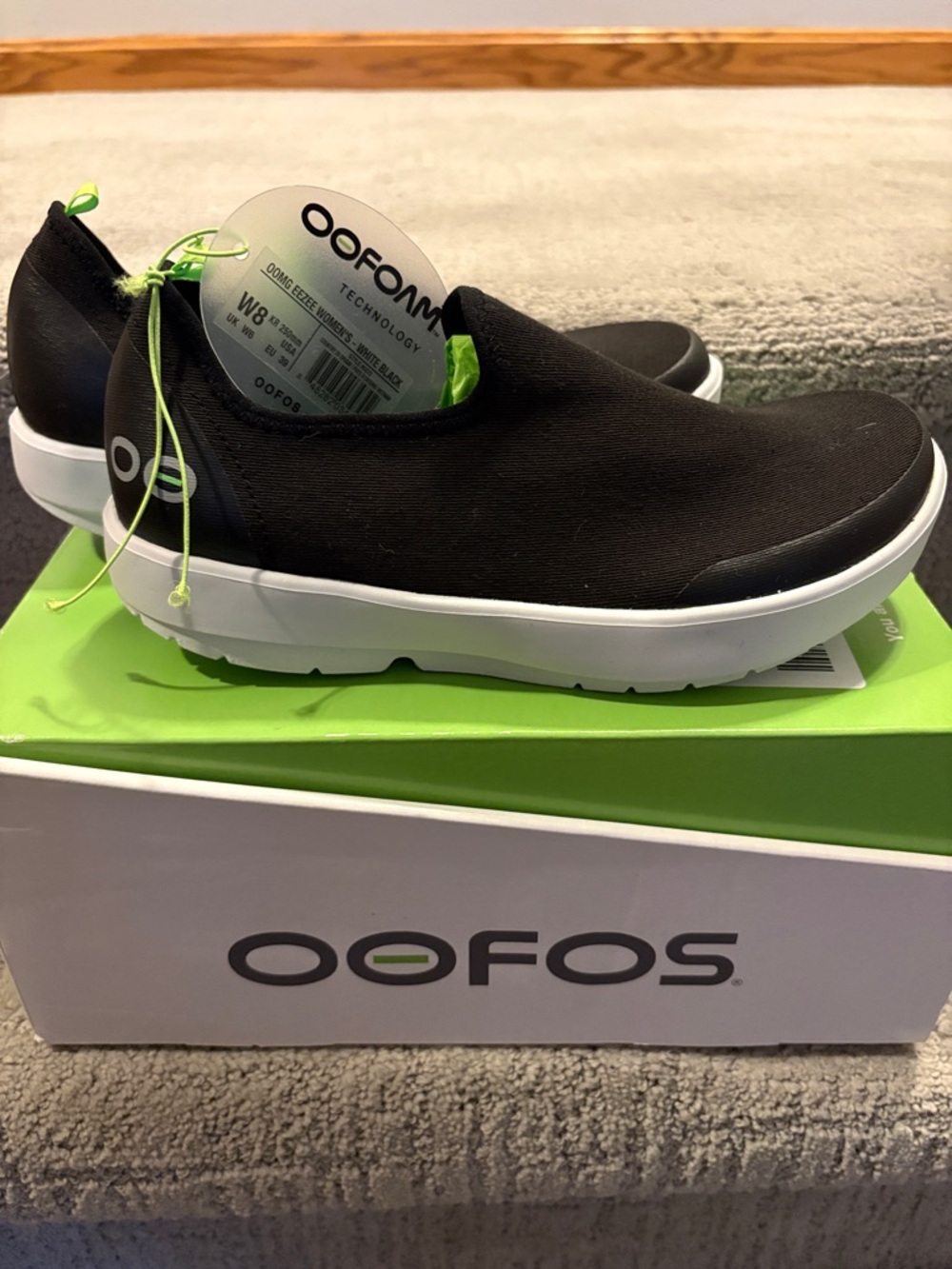 OOFOS Black Slip-On Casual Shoe with White Sole and Lime Accents